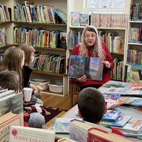 Heidi librarian reading to children